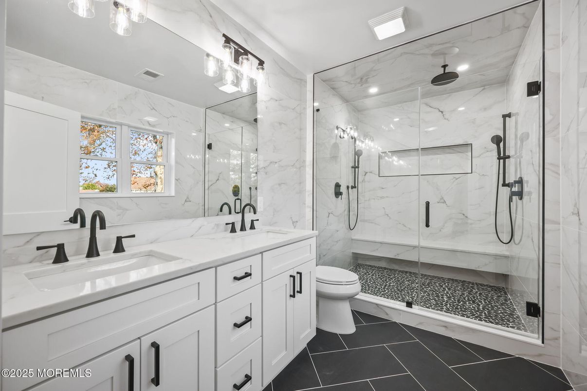 Bathroom, Dual Sink Vanities, Glass Shower, Interior, Marble Walls, Recessed Lighting