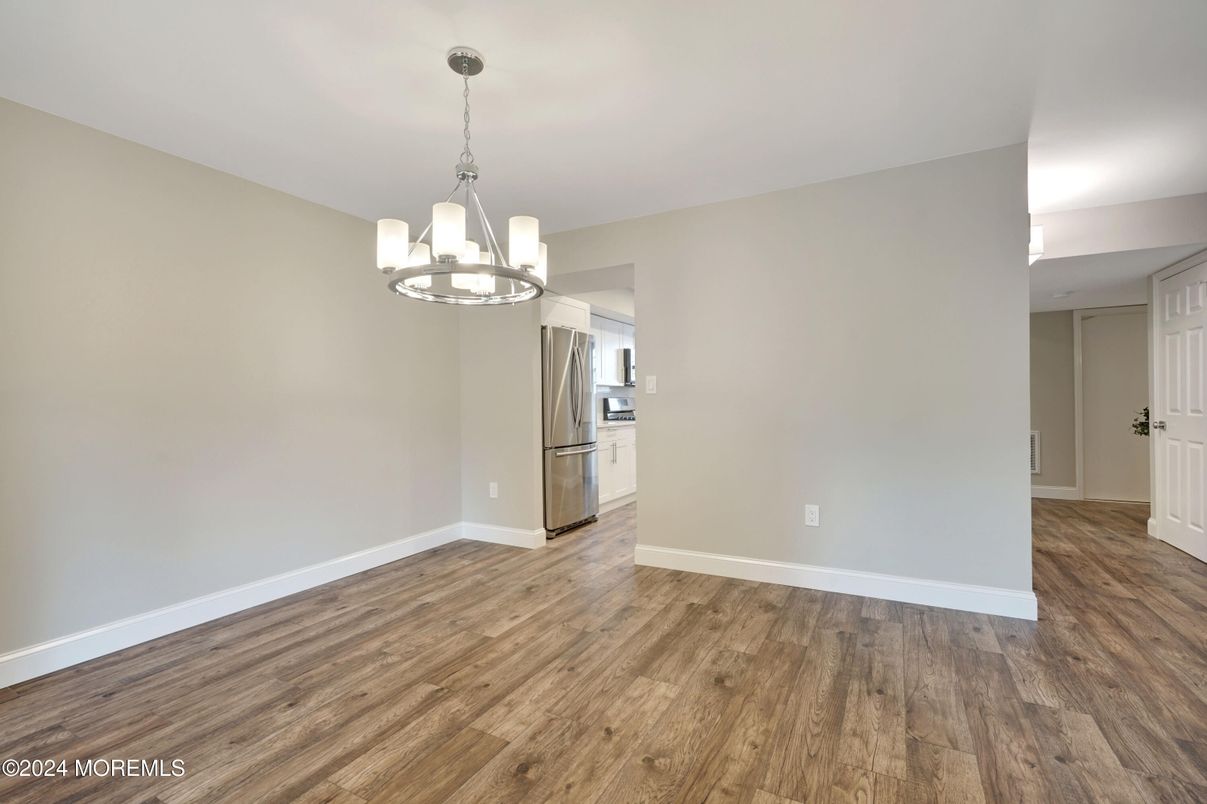 Chandelier, Empty room, Interior, Kitchen, Stainless Steel Appliances, Wood Texture Flooring