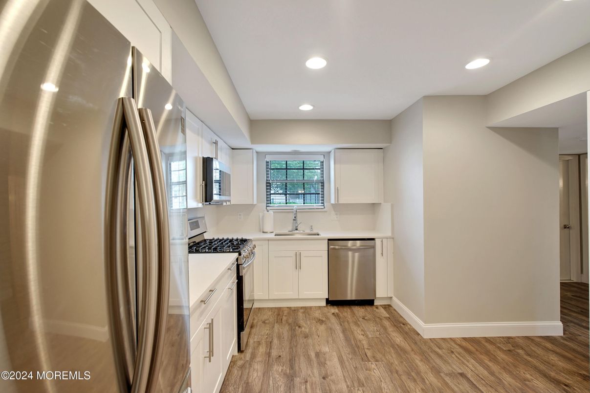 Interior, Kitchen, Recessed Lighting, Stainless Steel Appliances, Wood Texture Flooring