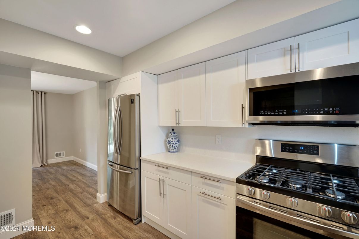 Interior, Kitchen, Recessed Lighting, Stainless Steel Appliances, Wood Texture Flooring