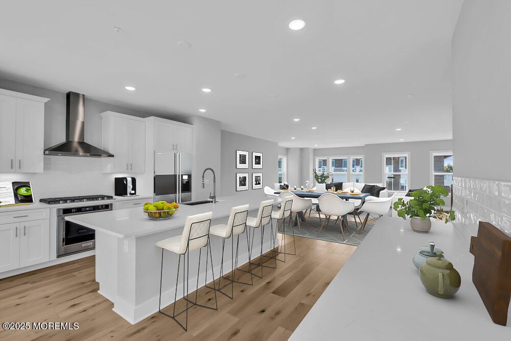 Dining room, Interior, Kitchen, Recessed Lighting, Stainless Steel Appliances, Wood Texture Flooring