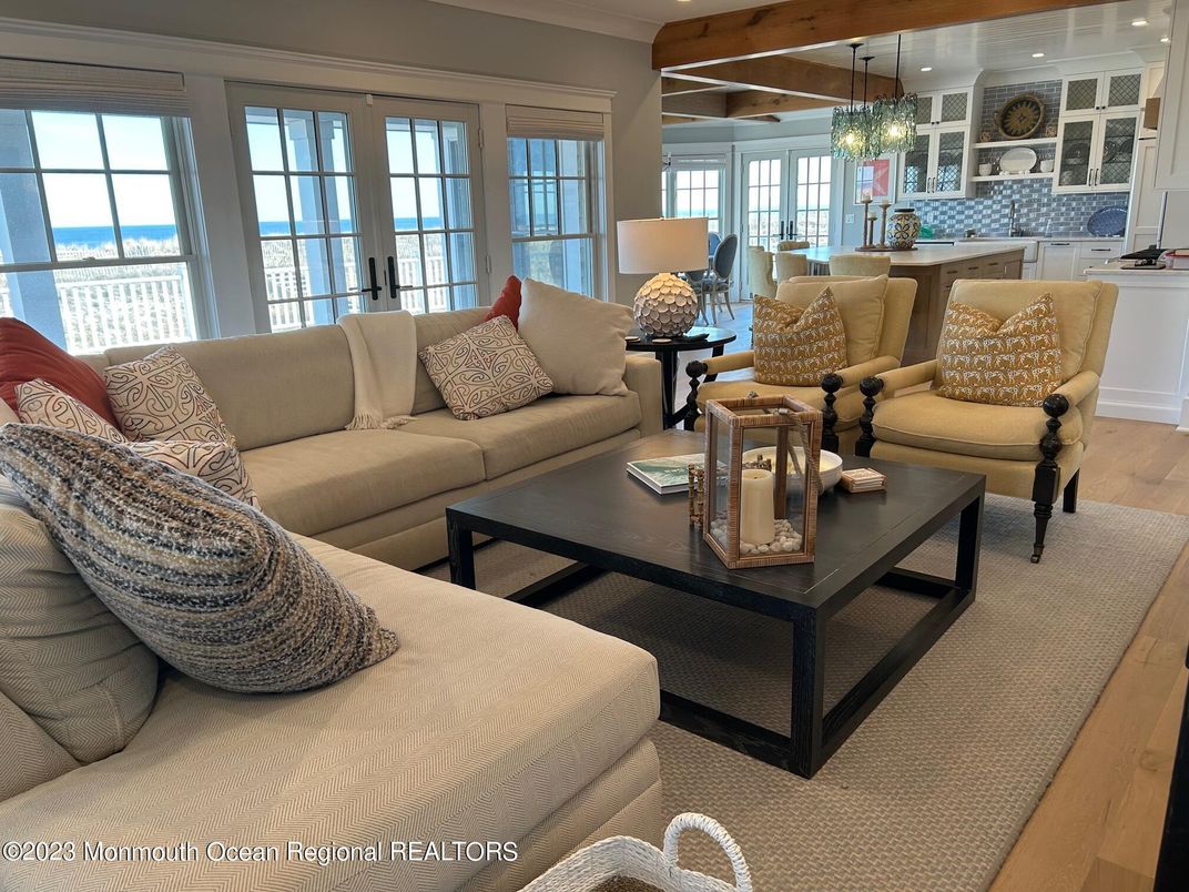 Chandelier, Dining room, Interior, Kitchen, Living room, Pendant Lights, Recessed Lighting, Water, Wooden Beams, Wood Texture Flooring