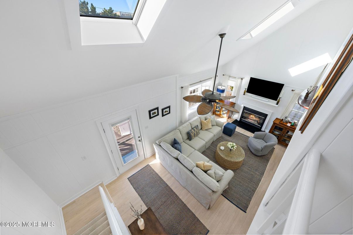 Dining room, Fireplace, Interior, Living room, Pendant Lights, Wood Texture Flooring
