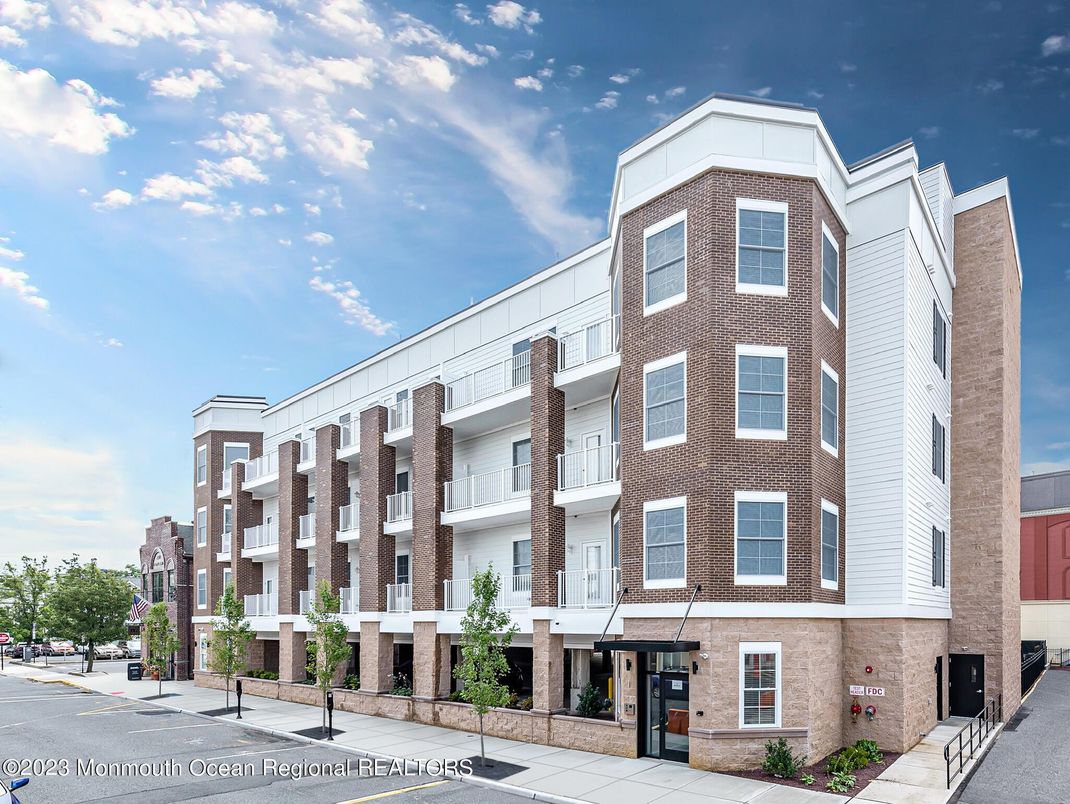 Exterior, Facade, Brick Facade, Condo Building