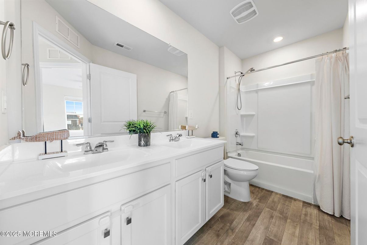 Bathroom, Dual Sink Vanities, Interior, Recessed Lighting, Wood Texture Flooring