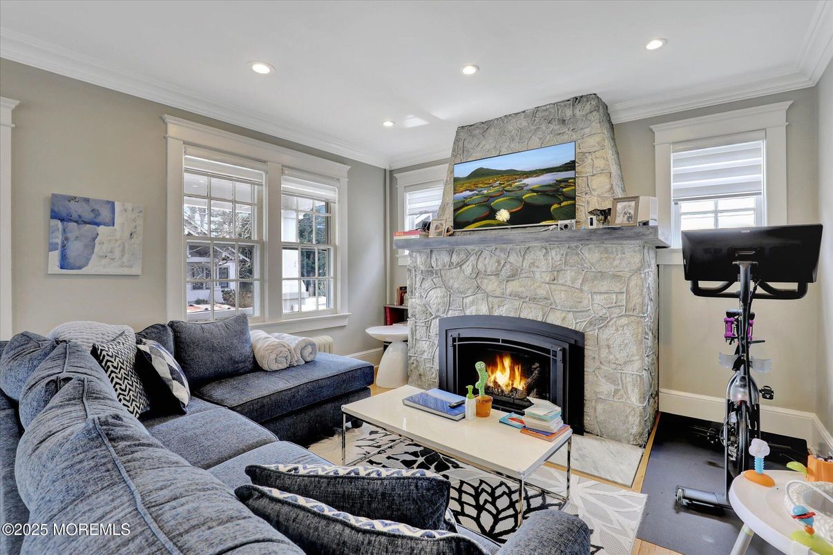Fireplace, Fitness Equipment, Interior, Living room, Recessed Lighting, Stone Walls