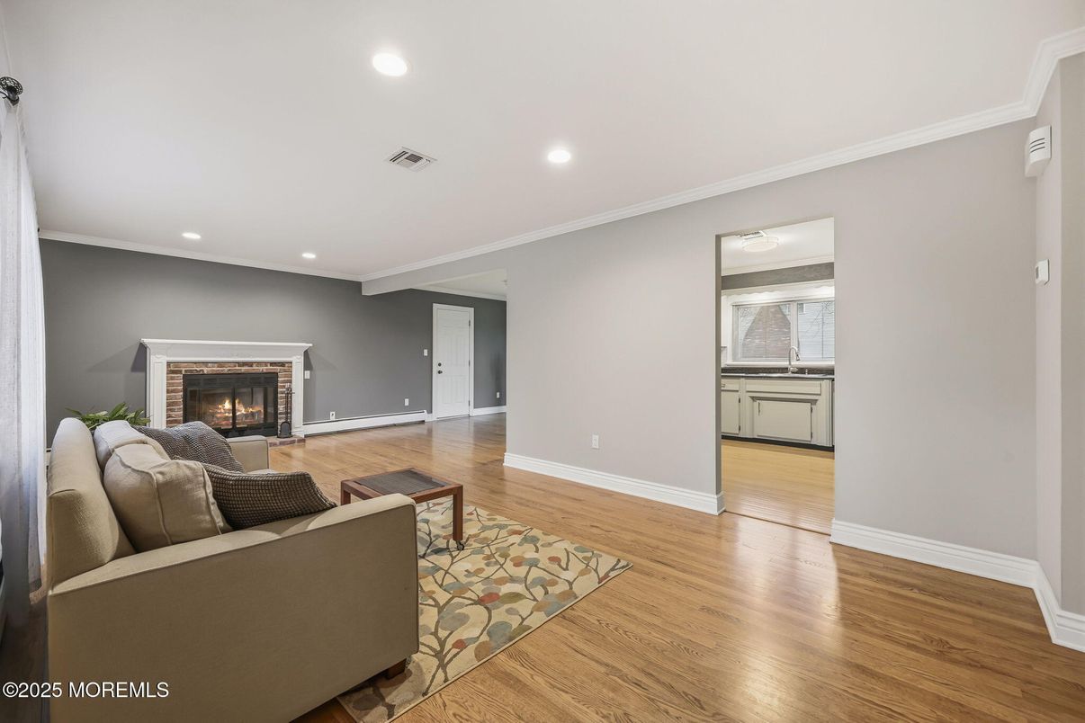 Fireplace, Interior, Living room, Recessed Lighting, Wood Texture Flooring