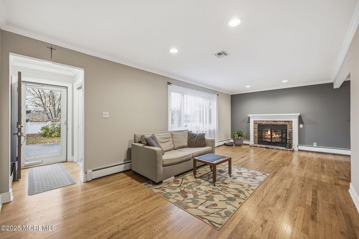 Fireplace, Interior, Living room, Recessed Lighting, Wood Texture Flooring