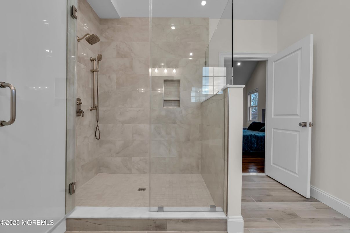 Bathroom, Glass Shower, Interior, Marble Walls, Recessed Lighting, Wood Texture Flooring