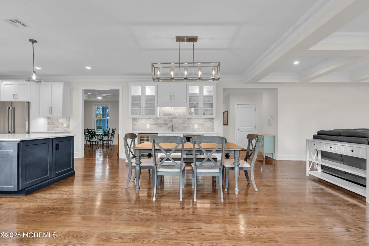 Dining room, Interior, Kitchen, Pendant Lights, Recessed Lighting, Stainless Steel Appliances, Wood Texture Flooring