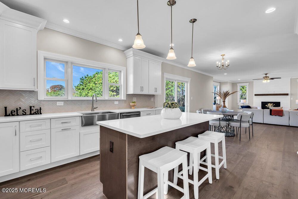 Dining room, Fireplace, Interior, Kitchen, Pendant Lights, Recessed Lighting, Wood Texture Flooring