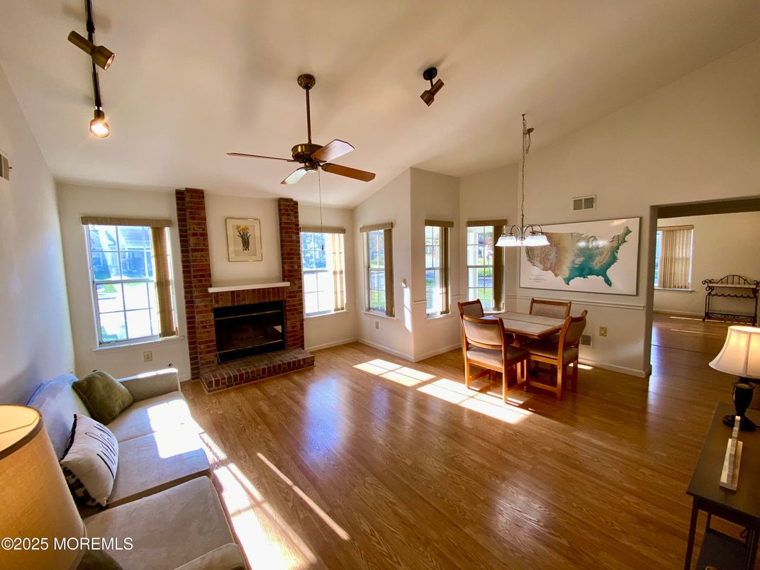 Dining room, Fireplace, Interior, Pendant Lights, Wood Texture Flooring