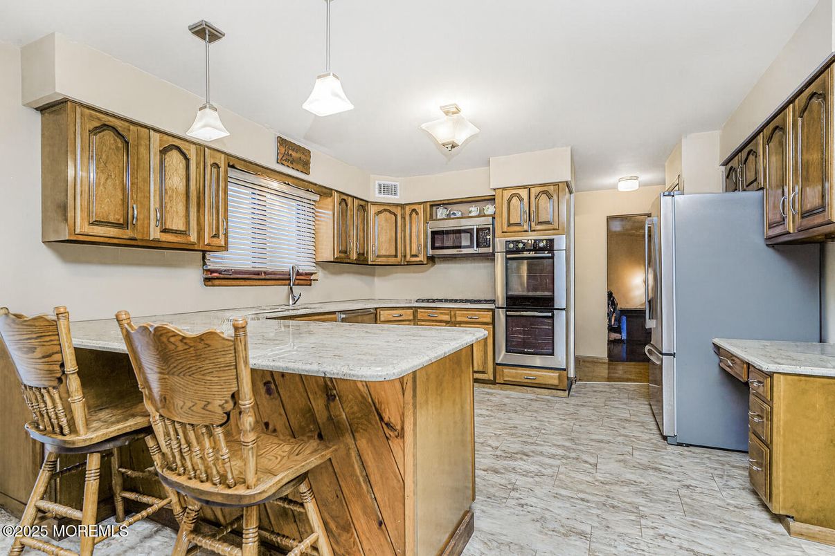 Interior, Kitchen, Marble, Pendant Lights, Stainless Steel Appliances, Wood Texture Flooring