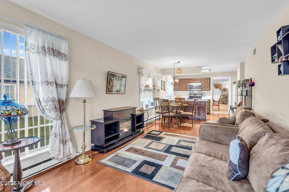 Dining room, Fireplace, Interior, Kitchen, Living room, Pendant Lights, Wood Texture Flooring