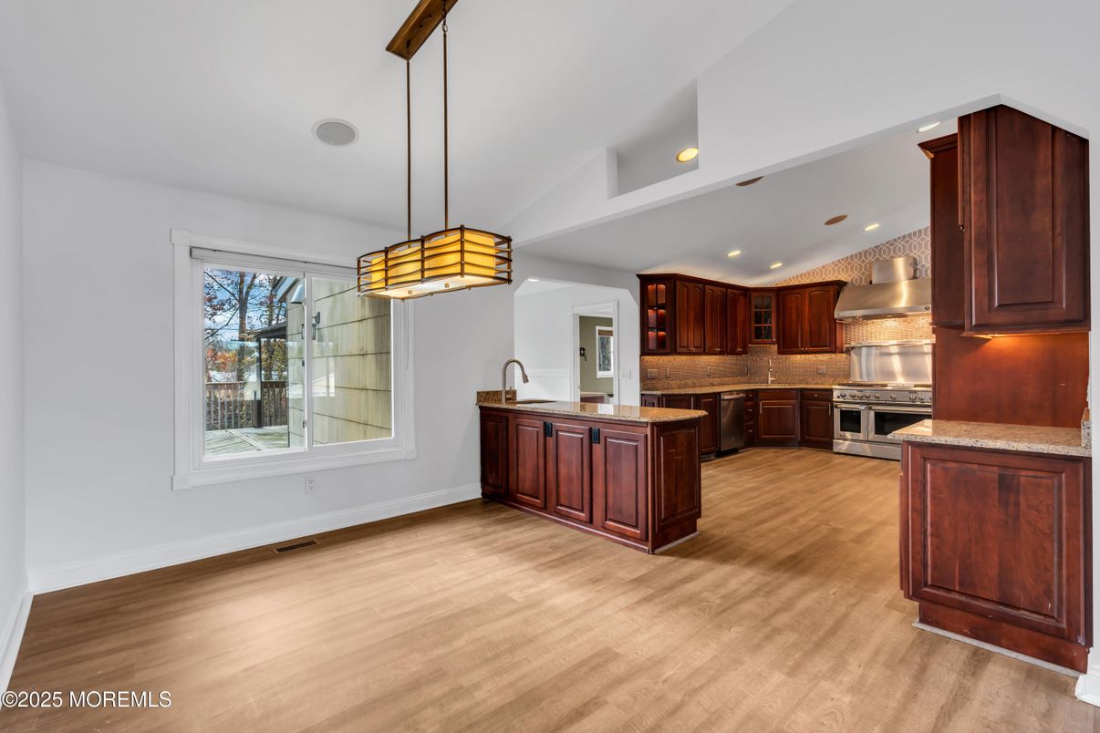 Interior, Kitchen, Pendant Lights, Recessed Lighting, Stainless Steel Appliances, Wood Texture Flooring