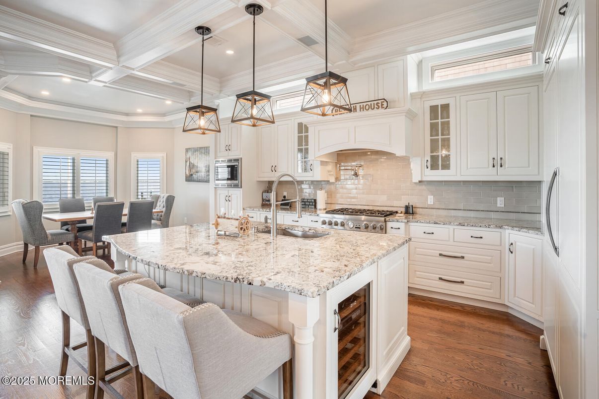 Dining room, Interior, Kitchen, Pendant Lights, Recessed Lighting, Stainless Steel Appliances, Wood Texture Flooring