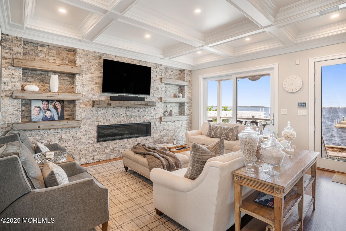 Fireplace, Interior, Living room, Recessed Lighting, Stone Walls, Water