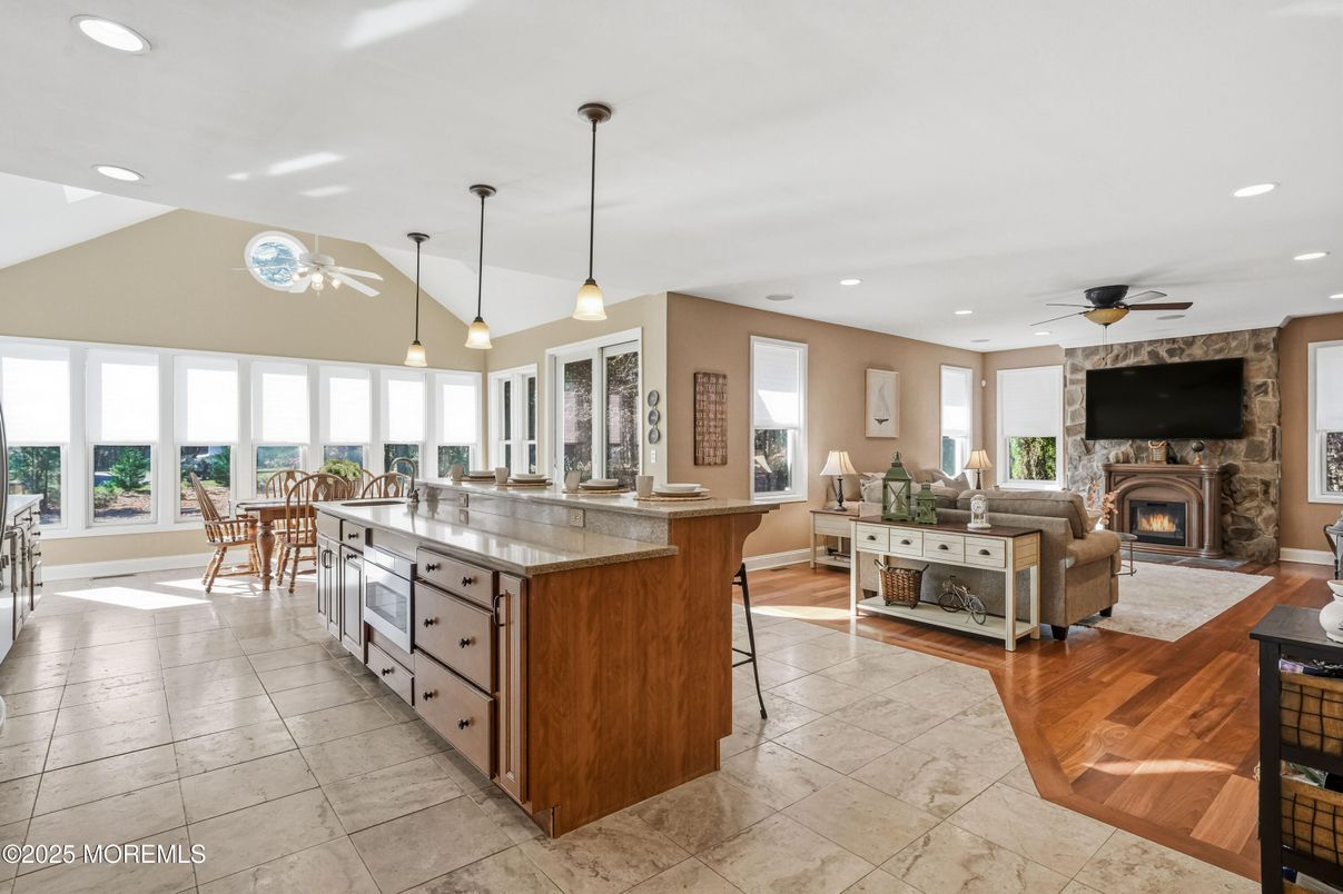 Dining room, Fireplace, Interior, Kitchen, Living room, Pendant Lights, Recessed Lighting, Wood Texture Flooring