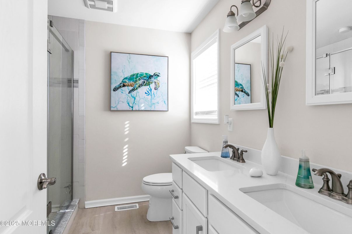 Bathroom, Dual Sink Vanities, Glass Shower, Interior, Wood Texture Flooring