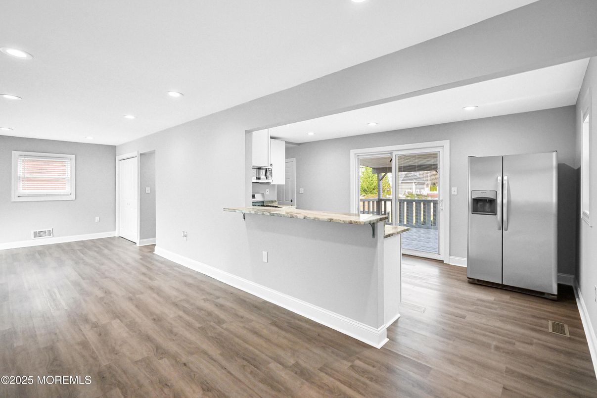 Interior, Kitchen, Recessed Lighting, Stainless Steel Appliances, Wood Texture Flooring