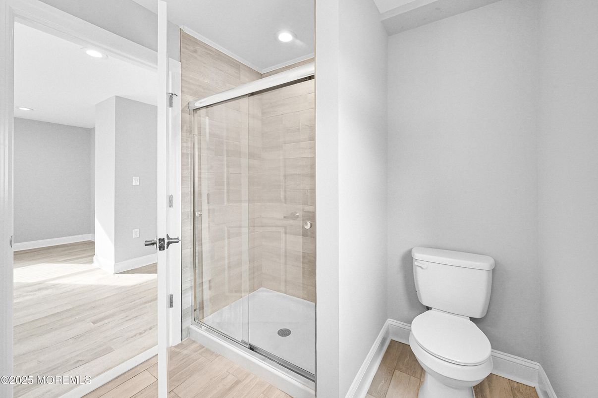 Bathroom, Glass Shower, Interior, Recessed Lighting, Wood Texture Flooring