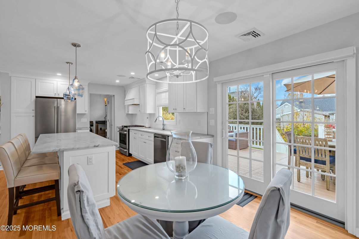 Dining room, Interior, Kitchen, Pendant Lights, Recessed Lighting, Stainless Steel Appliances, Wood Texture Flooring