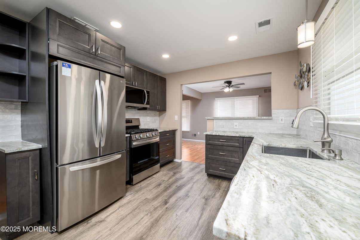 Interior, Kitchen, Pendant Lights, Recessed Lighting, Stainless Steel Appliances, Wood Texture Flooring