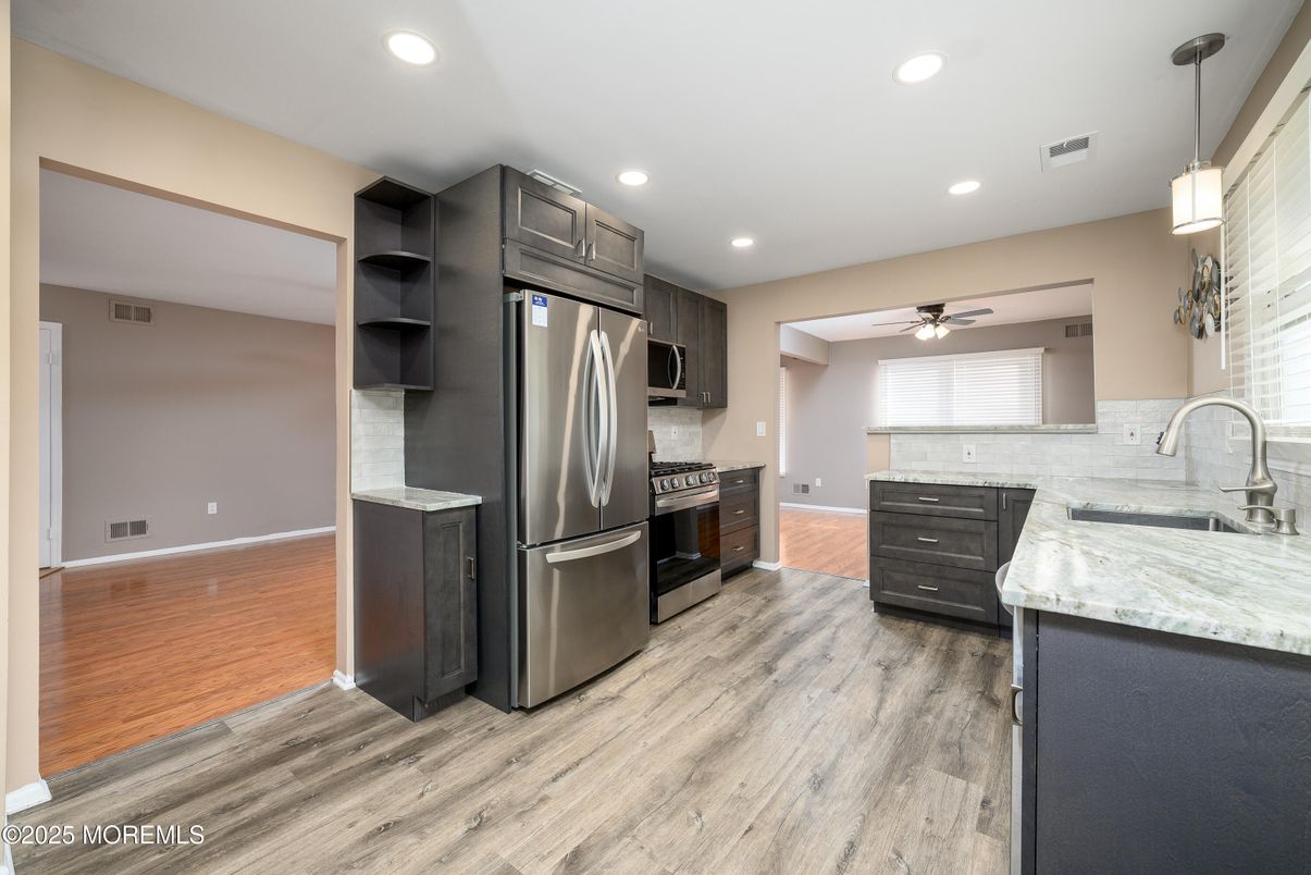 Interior, Kitchen, Pendant Lights, Recessed Lighting, Stainless Steel Appliances, Wood Texture Flooring