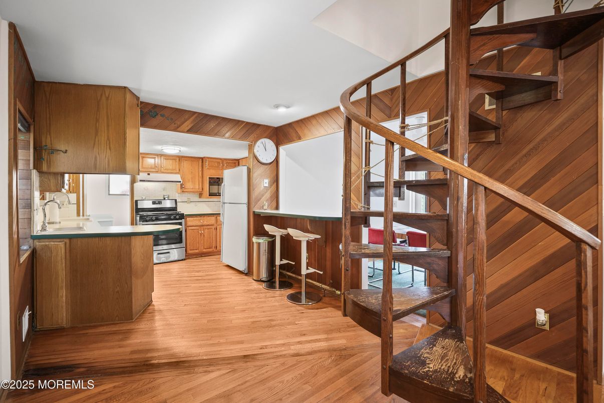 Interior, Kitchen, Stainless Steel Appliances, Wood Texture Flooring, Wooden Walls