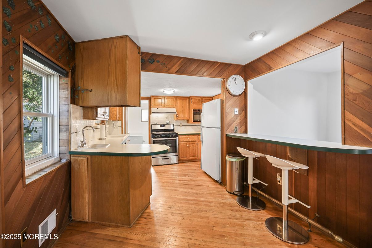 Interior, Kitchen, Stainless Steel Appliances, Wood Texture Flooring, Wooden Walls