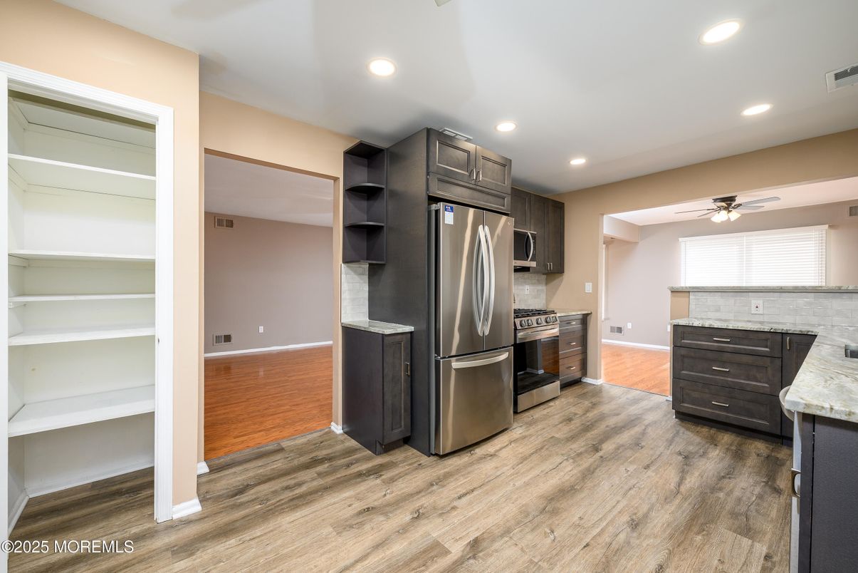 Interior, Kitchen, Recessed Lighting, Stainless Steel Appliances, Wood Texture Flooring