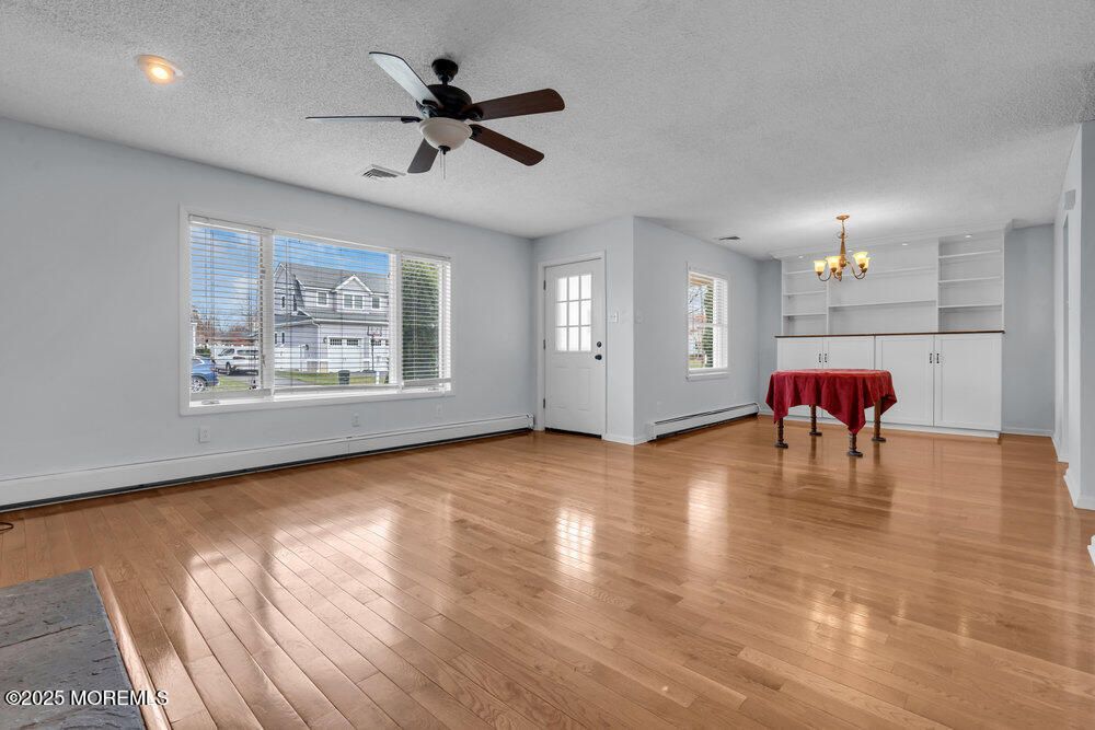 Chandelier, Empty room, Interior, Recessed Lighting, Wood Texture Flooring