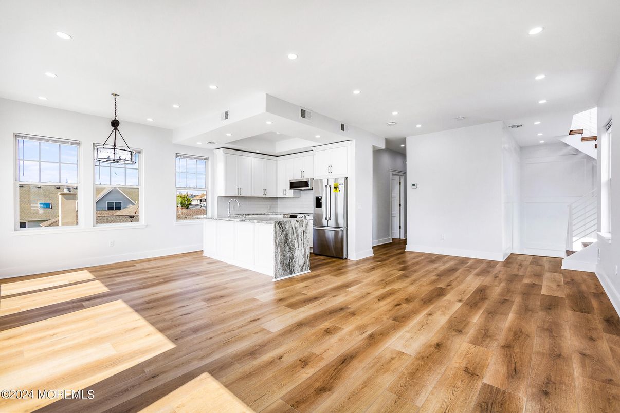 Interior, Kitchen, Pendant Lights, Recessed Lighting, Stainless Steel Appliances, Wood Texture Flooring