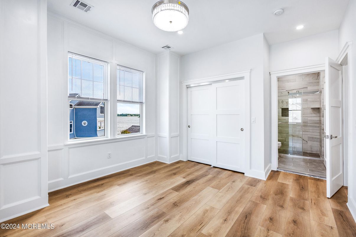Bathroom, Empty room, Glass Shower, Interior, Recessed Lighting, Wood Texture Flooring