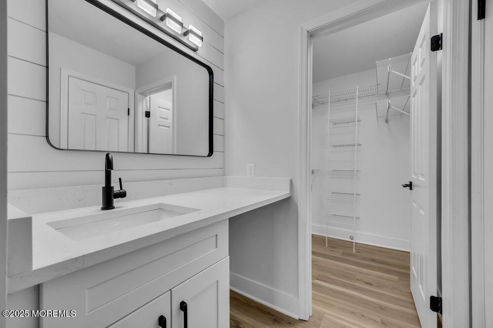 Bathroom, Dual Sink Vanities, Interior, Walk-in Closets, Wood Texture Flooring