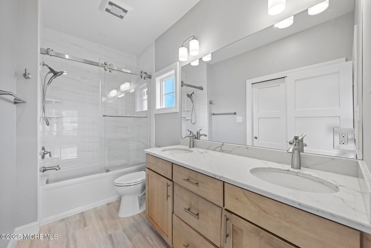 Bathroom, Dual Sink Vanities, Glass Shower, Interior, Wood Texture Flooring