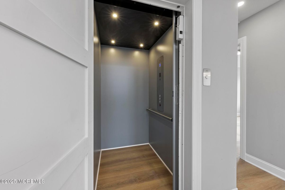 Elevator, Interior, Recessed Lighting, Wood Texture Flooring
