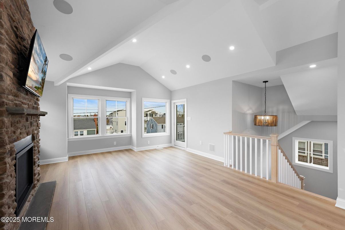 Empty room, Fireplace, Interior, Pendant Lights, Recessed Lighting, Wood Texture Flooring