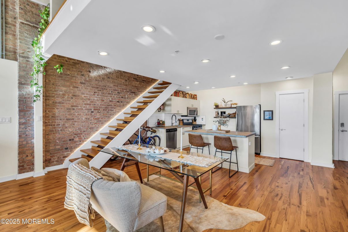 Interior, Kitchen, Recessed Lighting, Stainless Steel Appliances, Stone Walls, Wood Texture Flooring