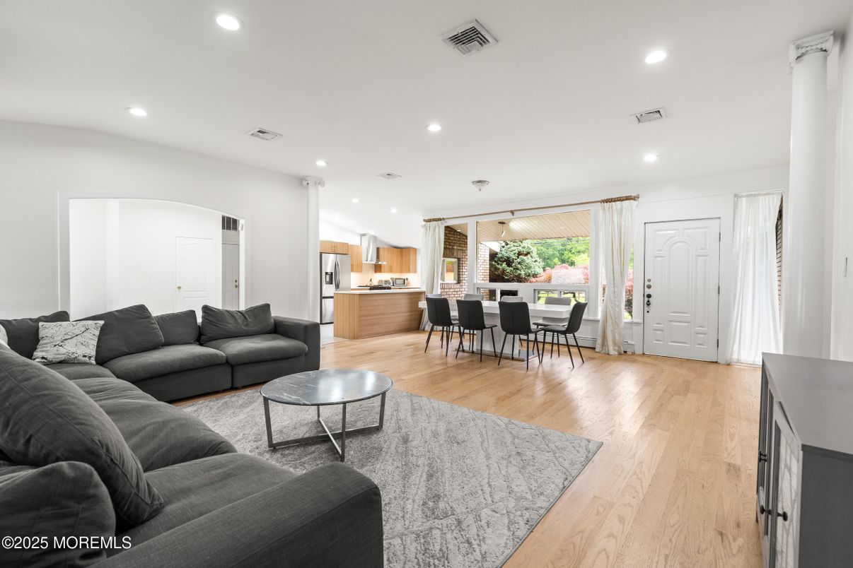 Dining room, Interior, Kitchen, Living room, Pendant Lights, Recessed Lighting, Stainless Steel Appliances, Wood Texture Flooring