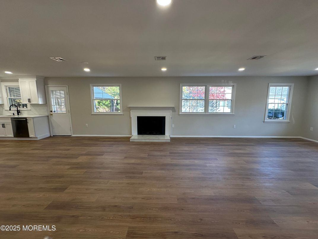 Empty room, Fireplace, Interior, Recessed Lighting, Wood Texture Flooring