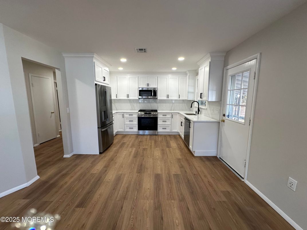 Interior, Kitchen, Recessed Lighting, Stainless Steel Appliances, Wood Texture Flooring