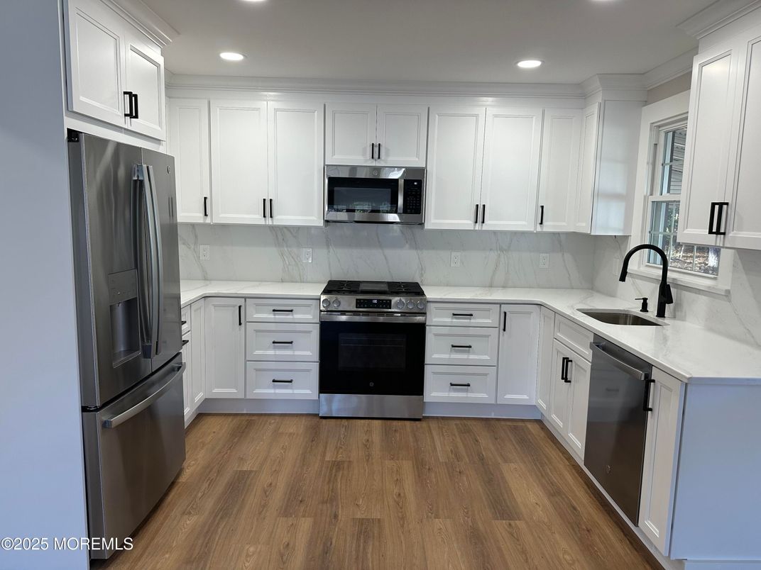 Interior, Kitchen, Recessed Lighting, Stainless Steel Appliances, Wood Texture Flooring