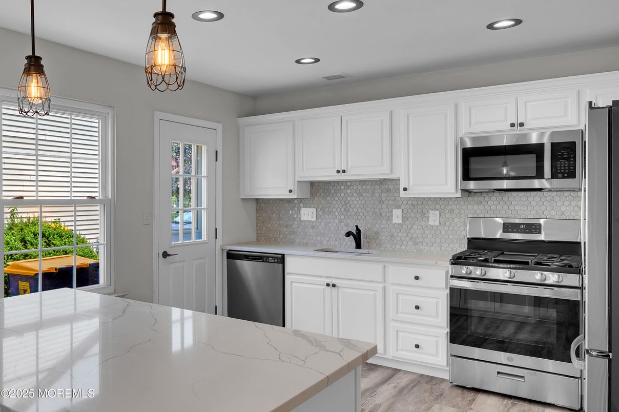 Interior, Kitchen, Pendant Lights, Recessed Lighting, Stainless Steel Appliances, Wood Texture Flooring