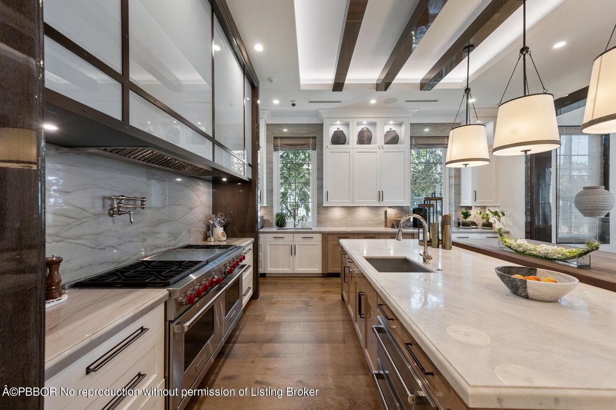 Interior, Kitchen, Marble Walls, Pendant Lights, Recessed Lighting, Stainless Steel Appliances, Wood Texture Flooring