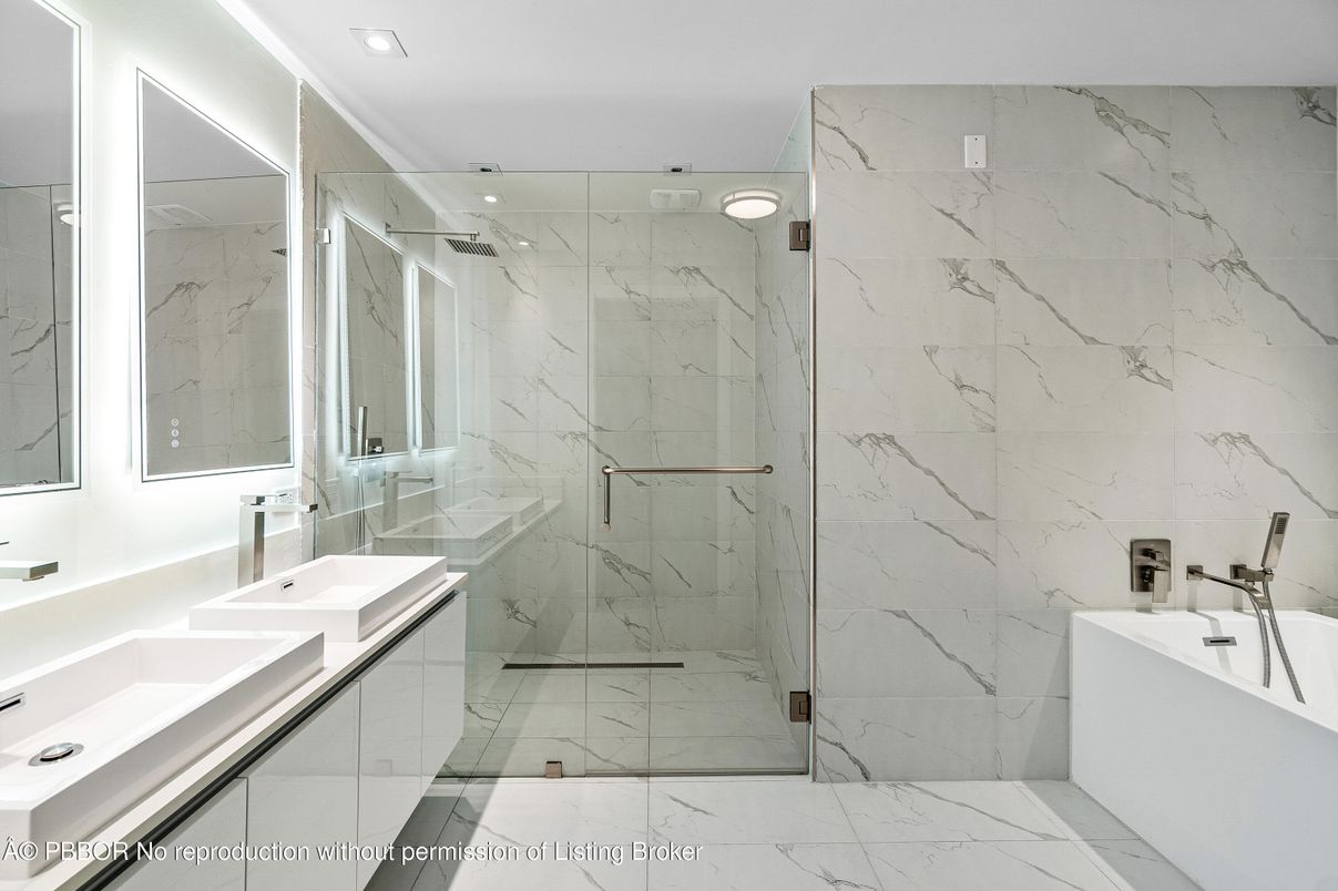 Bathroom, Dual Sink Vanities, Glass Shower, Interior, Marble, Marble Walls, Recessed Lighting