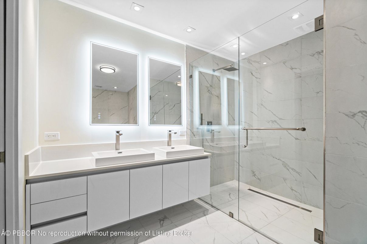 Bathroom, Dual Sink Vanities, Glass Shower, Interior, Marble, Marble Walls, Recessed Lighting