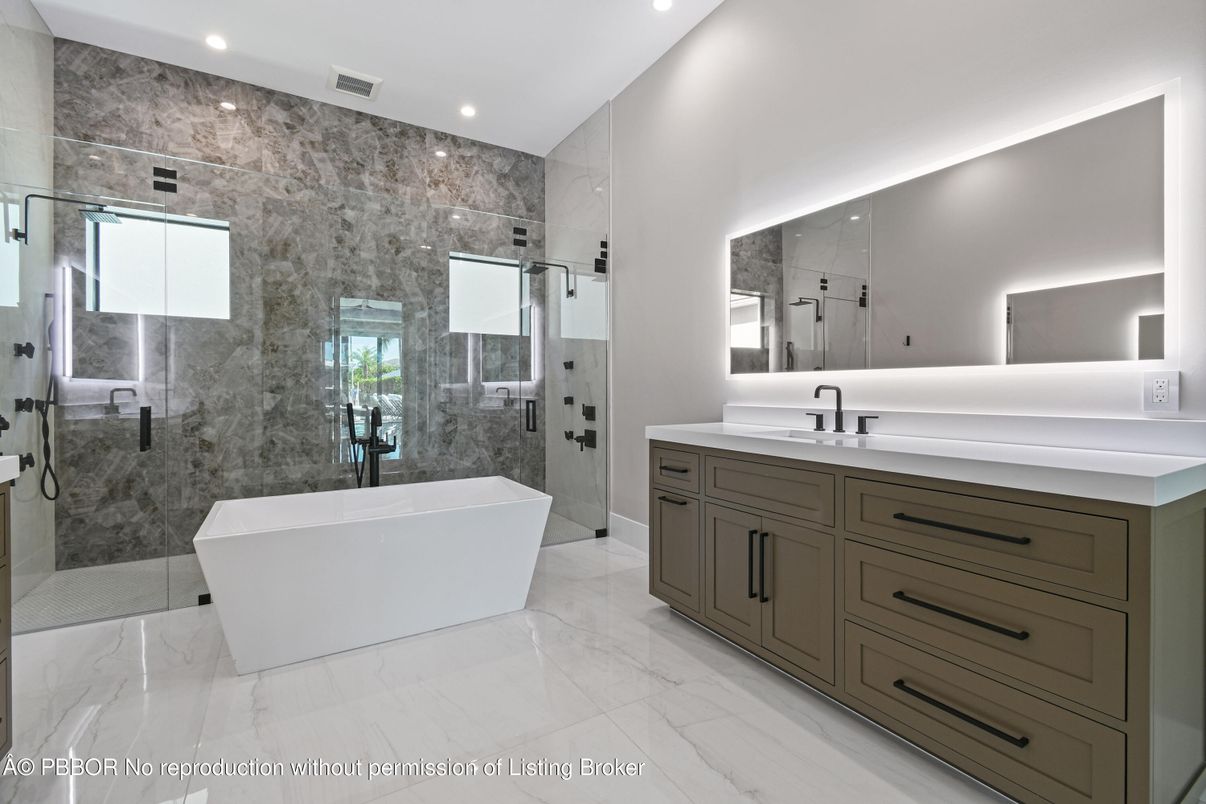 Bathroom, Dual Sink Vanities, Free Standing Baths, Glass Shower, Interior, Marble, Marble Walls, Recessed Lighting