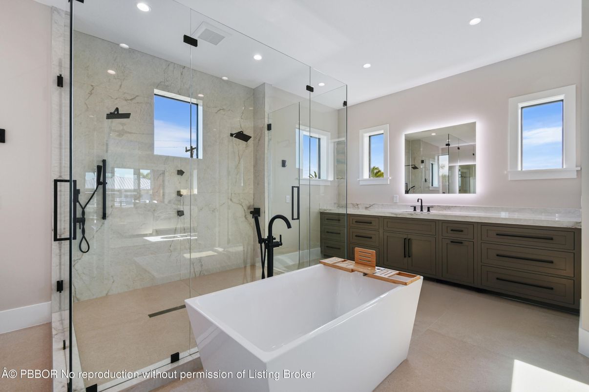 Bathroom, Dual Sink Vanities, Free Standing Baths, Glass Shower, Interior, Marble Walls, Recessed Lighting