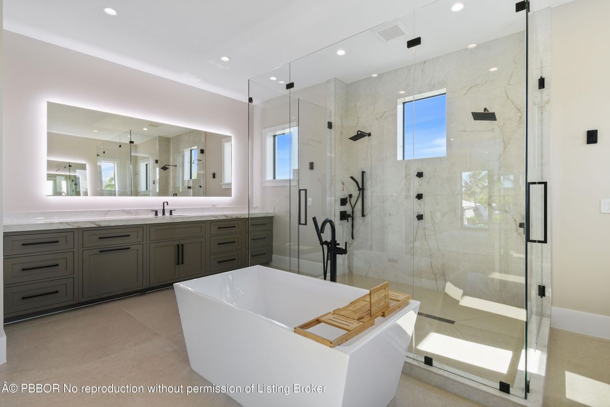 Bathroom, Dual Sink Vanities, Free Standing Baths, Glass Shower, Interior, Marble Walls, Recessed Lighting